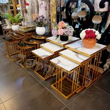 NESTING TABLES- THREE PILLARED GOLDEN BASE