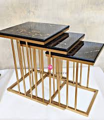 NESTING TABLES- THREE PILLARED GOLDEN BASE
