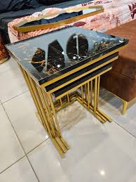NESTING TABLES- THREE PILLARED GOLDEN BASE