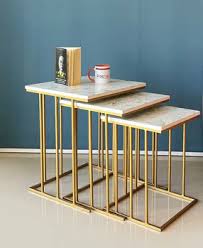 NESTING TABLES- THREE PILLARED GOLDEN BASE